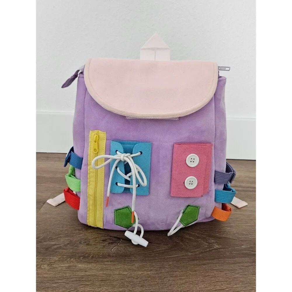 White Dolphin Toys Kids Busy Board Backpack in Lavender and Pink